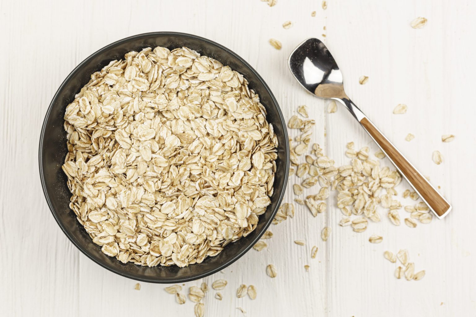 oatmeal bowl with spoon table scaled 1